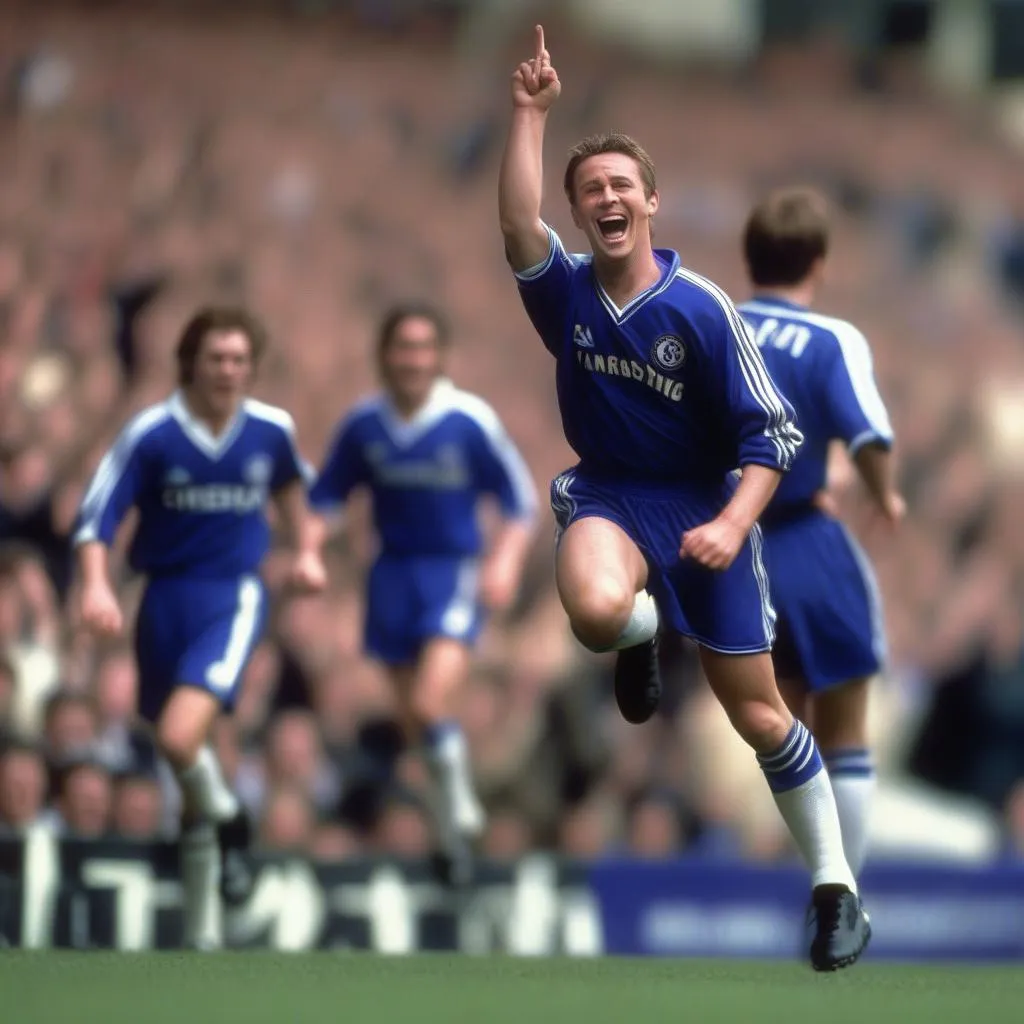 Craig Coakley celebrates scoring a goal for Chelsea