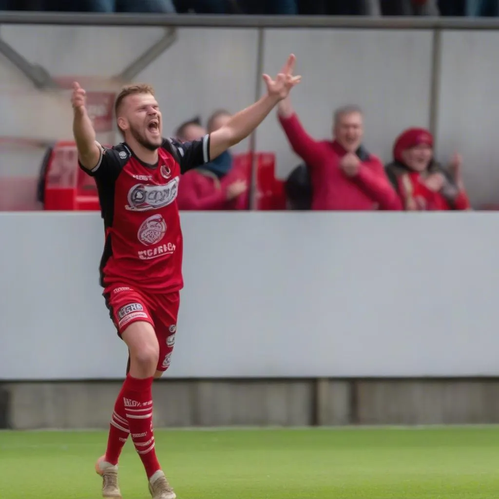 Cầu thủ Zulte Waregem ăn mừng bàn thắng