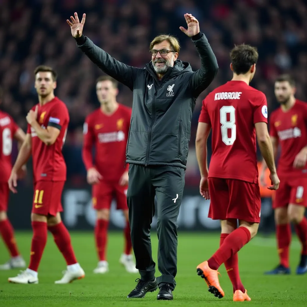 HLV Jurgen Klopp ăn mừng