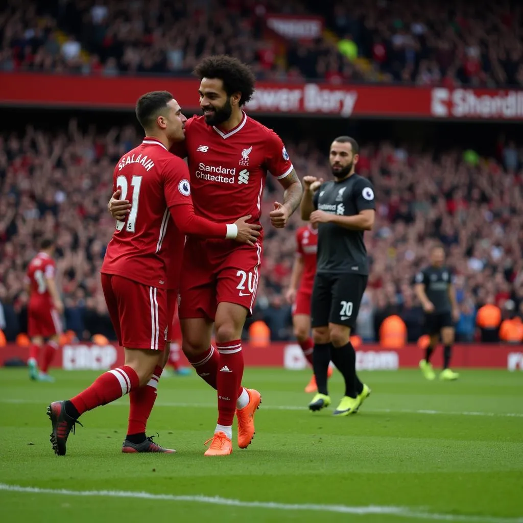 Salah and Mo celebrating a goal